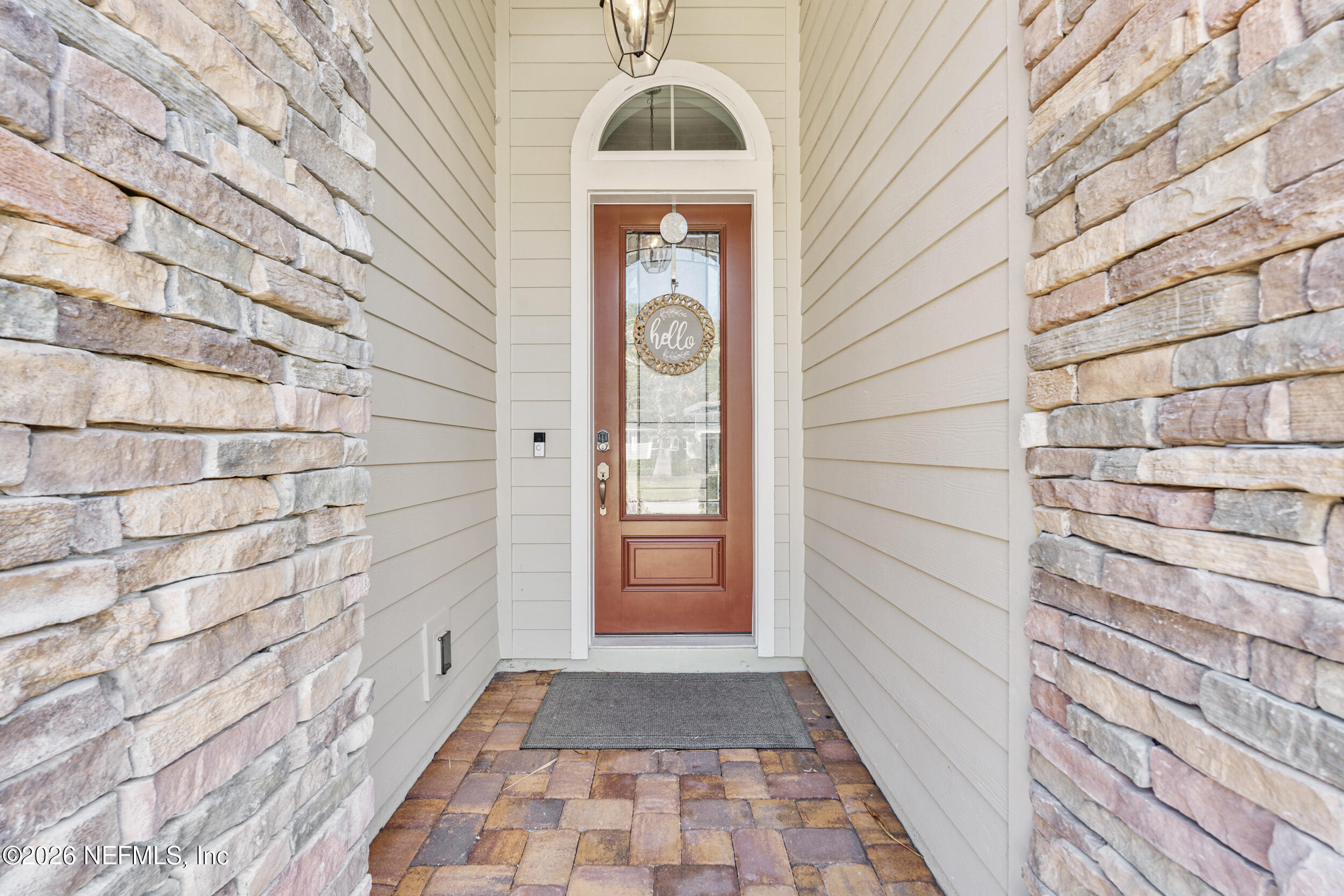 168 St Kitts Loop St. Augustine, FL 32092 - Photo 5 of 47 a view of a entryway door front of a house