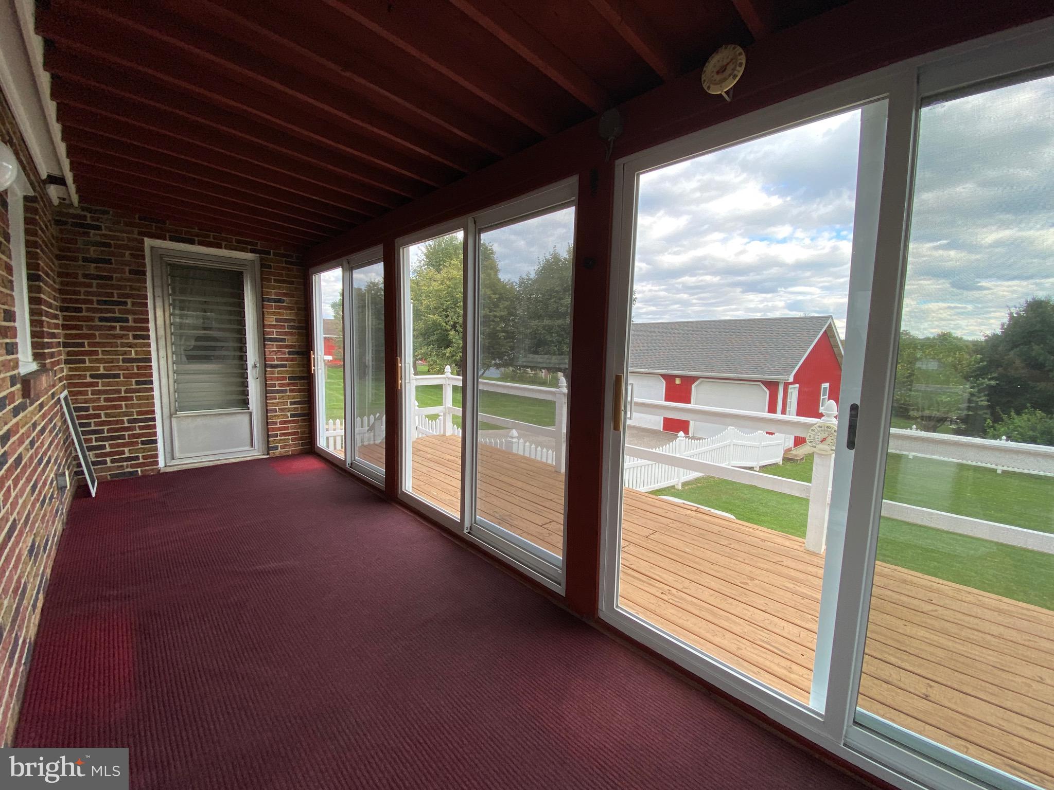 3738 Salem Road York, PA 17408 - Photo 17 of 27 3 Season room and open deck