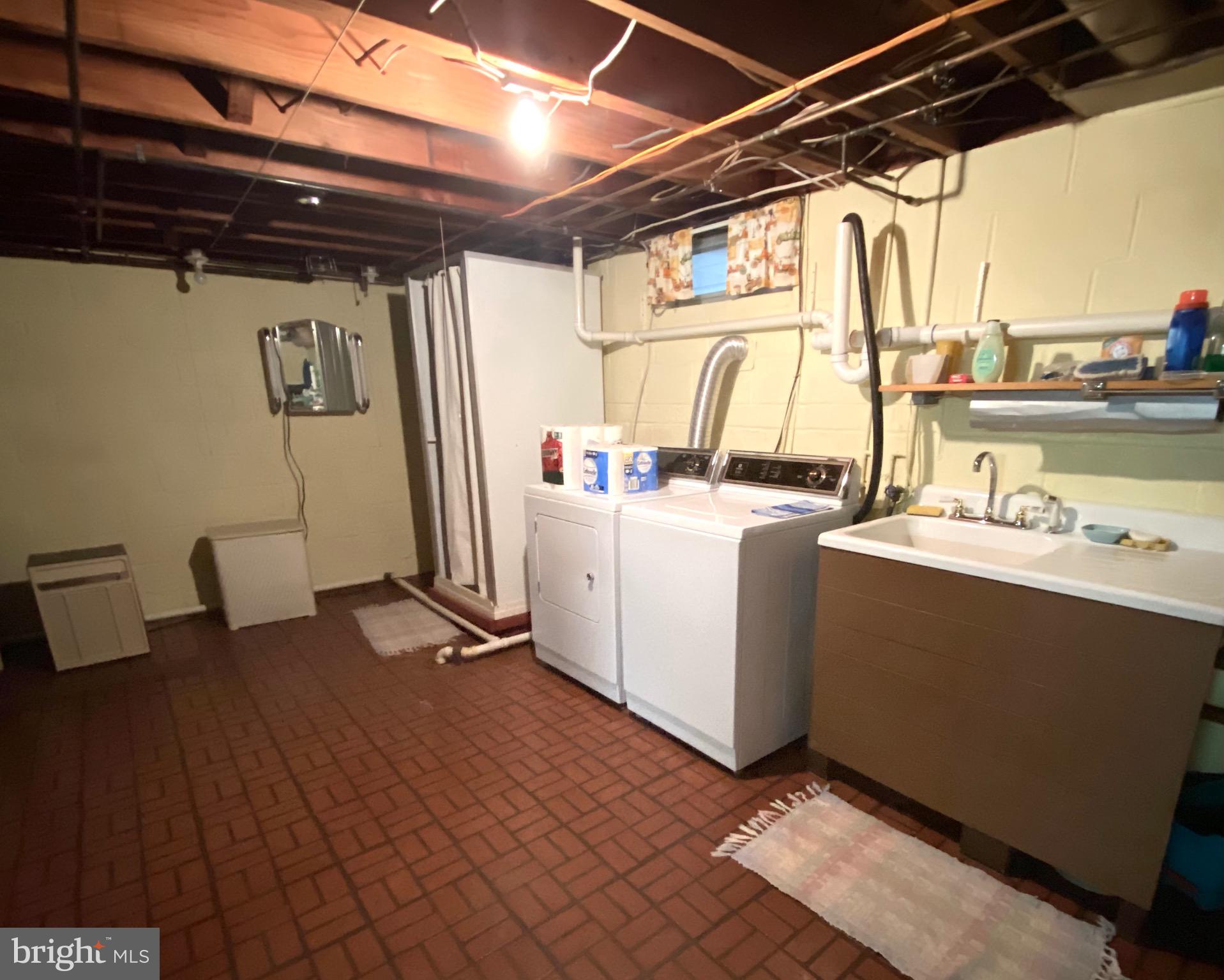 3738 Salem Road York, PA 17408 - Photo 20 of 27 Bsmt laundry with sink and shower stall
