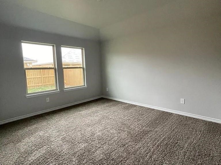 2317 Restful Lane Corpus Christi, TX 78418 - Photo 3 of 6 an empty room with a window