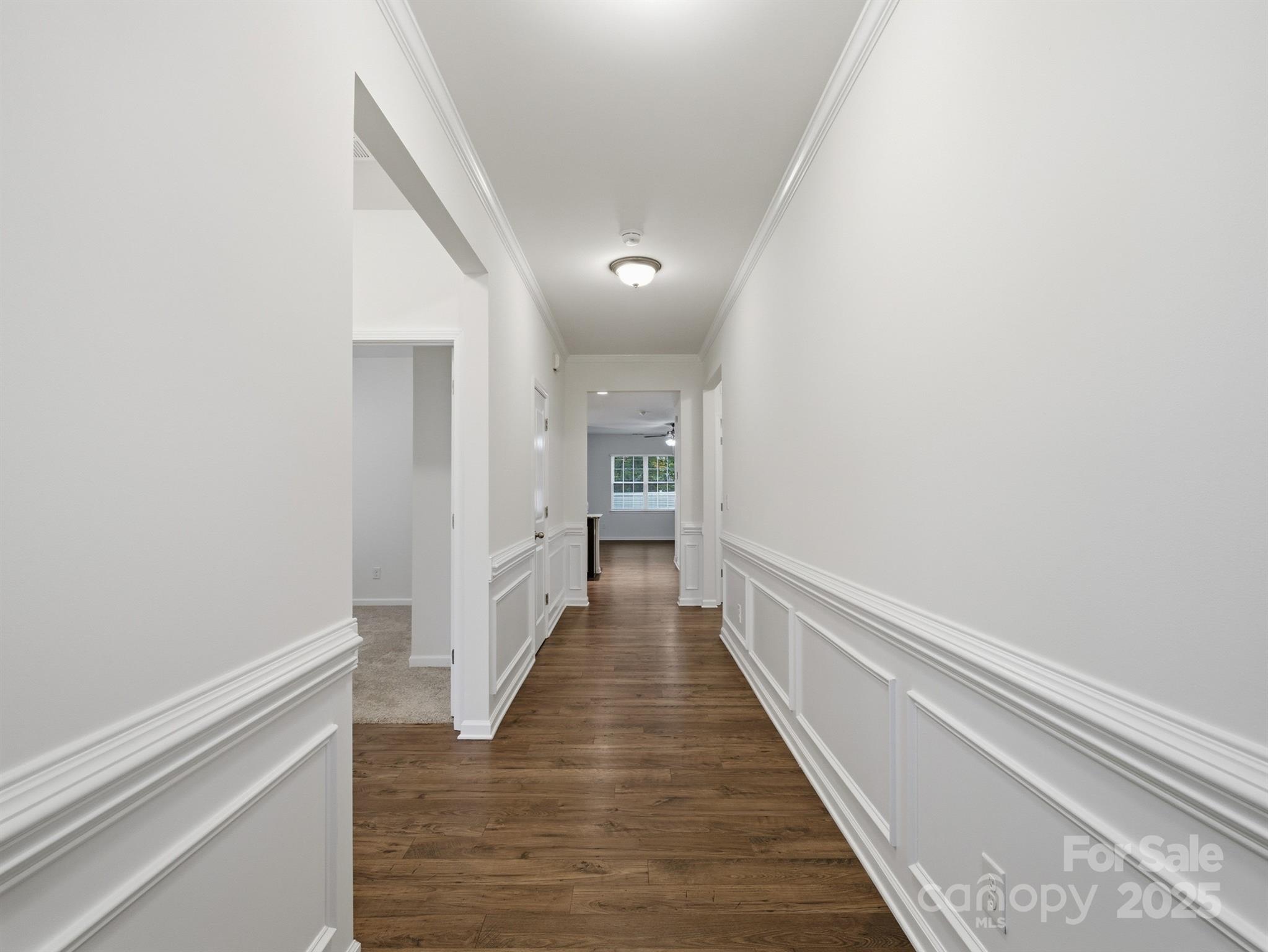2212 Apple Glen Lane Charlotte, NC 28269 - Photo 14 of 32 a view of a hallway with wooden floor