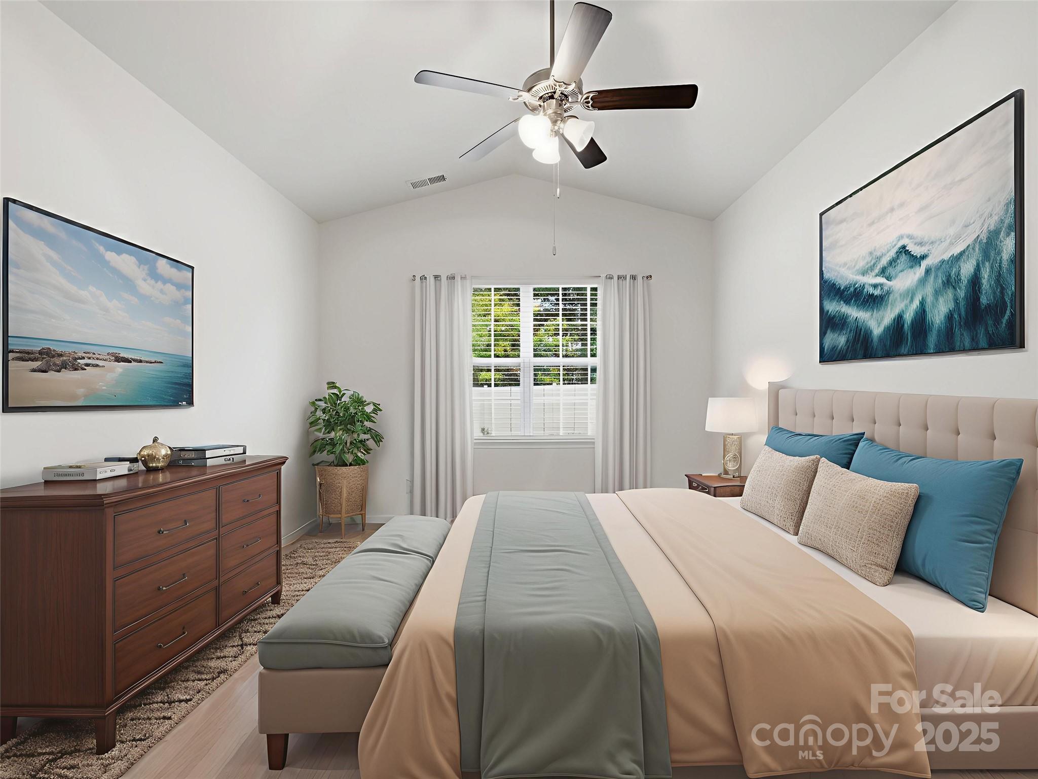 2212 Apple Glen Lane Charlotte, NC 28269 - Photo 16 of 32 a bedroom with a large bed and a dresser