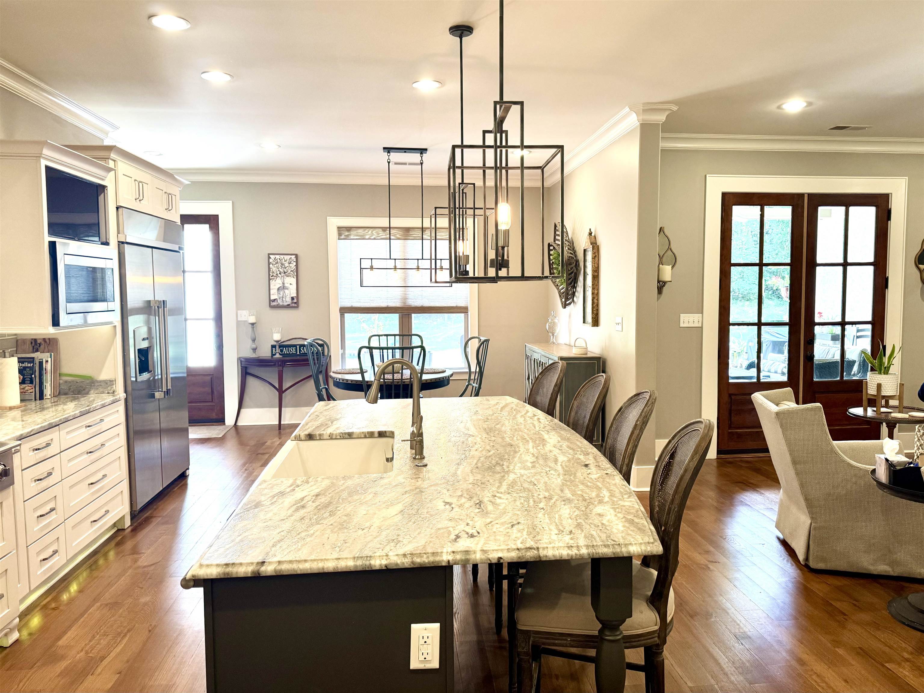 10879 Latting Road Eads, TN 38028 - Photo 14 of 40 a view of a dining room with furniture window and wooden floor