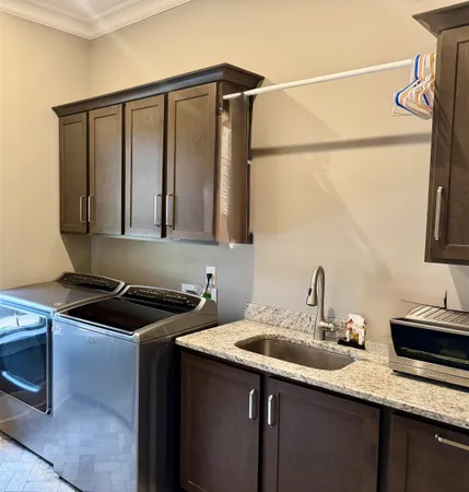 a bedroom with a stove and a cabinet