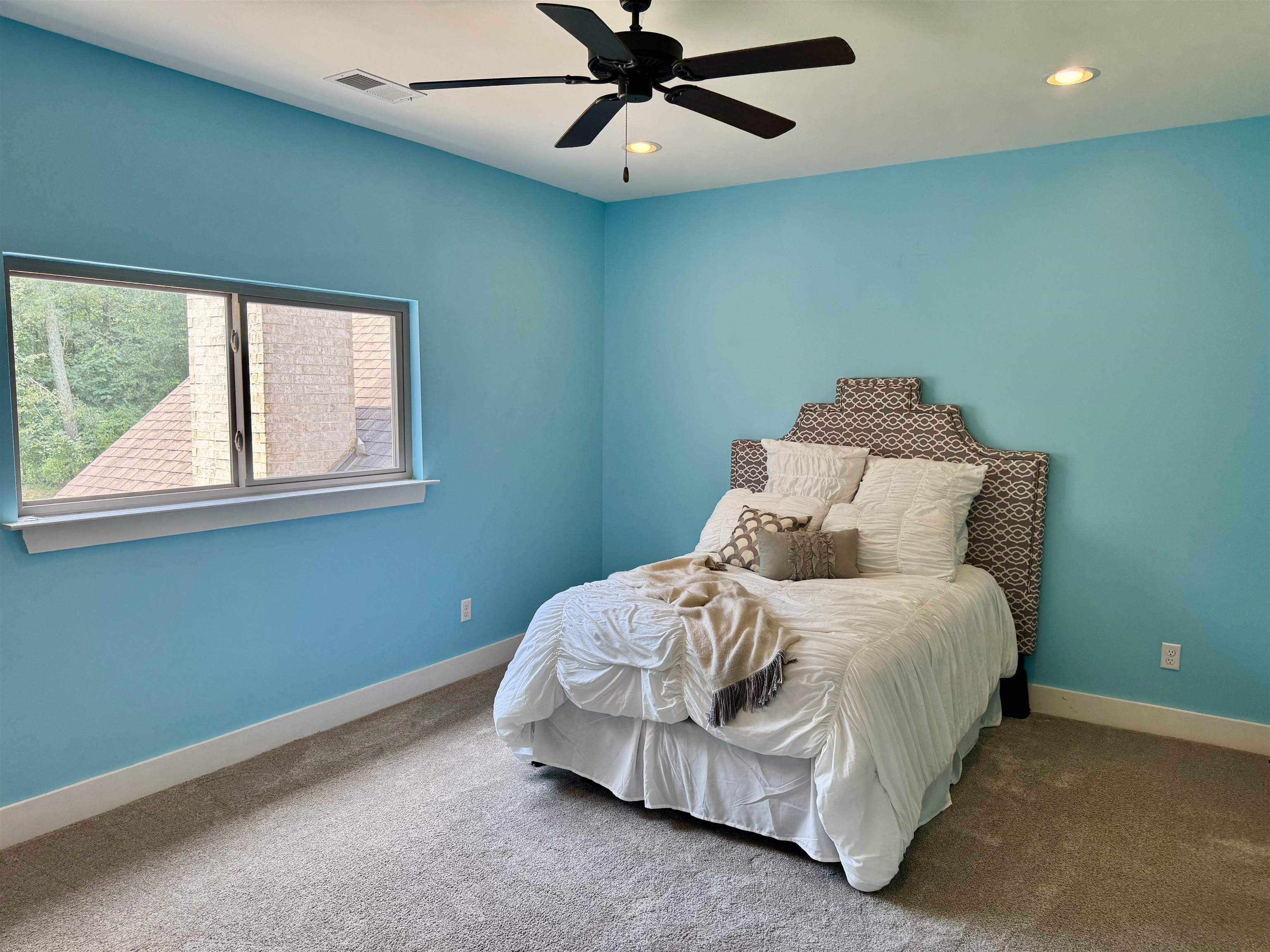 10879 Latting Road Eads, TN 38028 - Photo 30 of 40 a bedroom with a bed and window