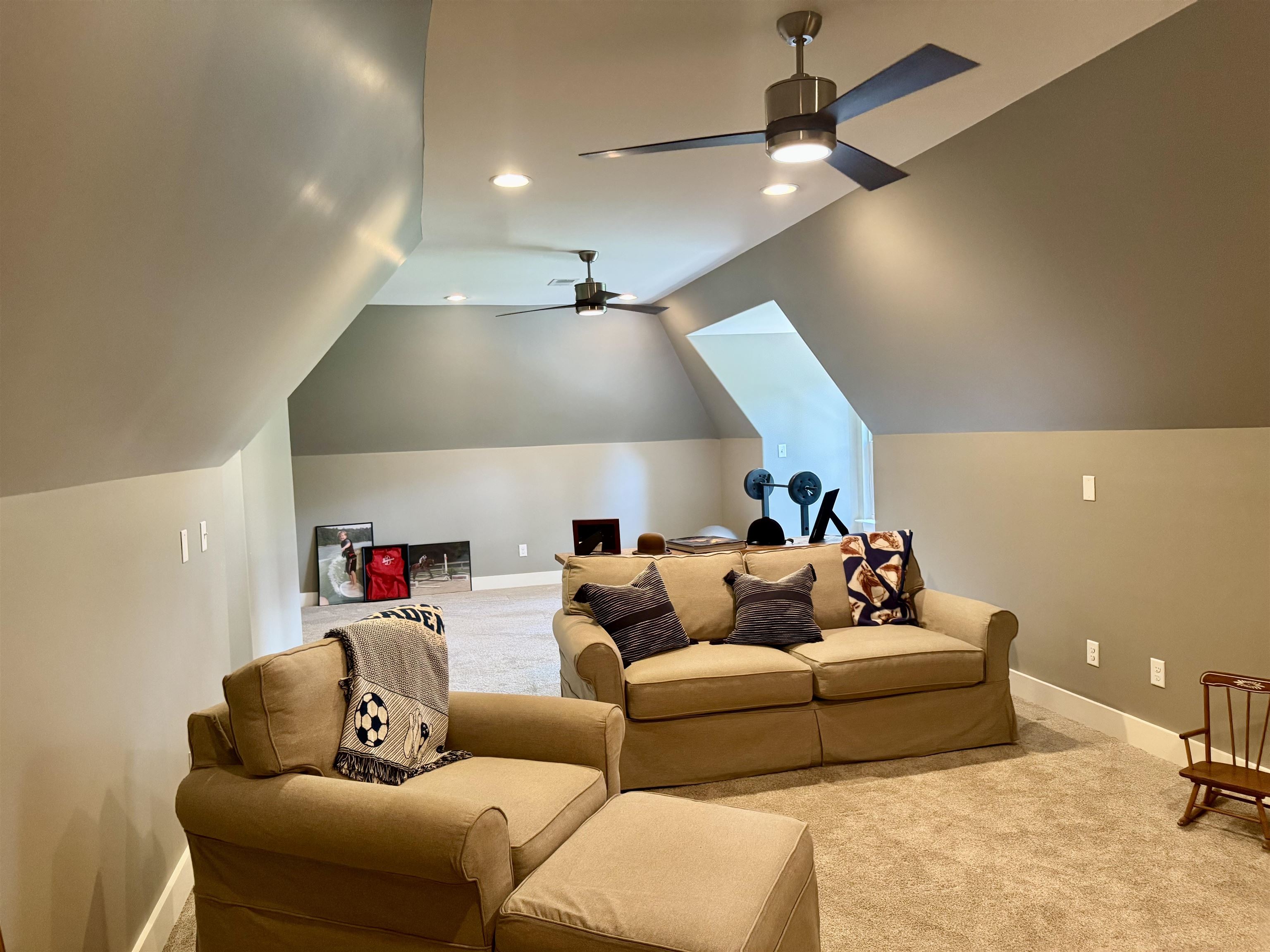 10879 Latting Road Eads, TN 38028 - Photo 33 of 40 a living room with furniture and a ceiling fan