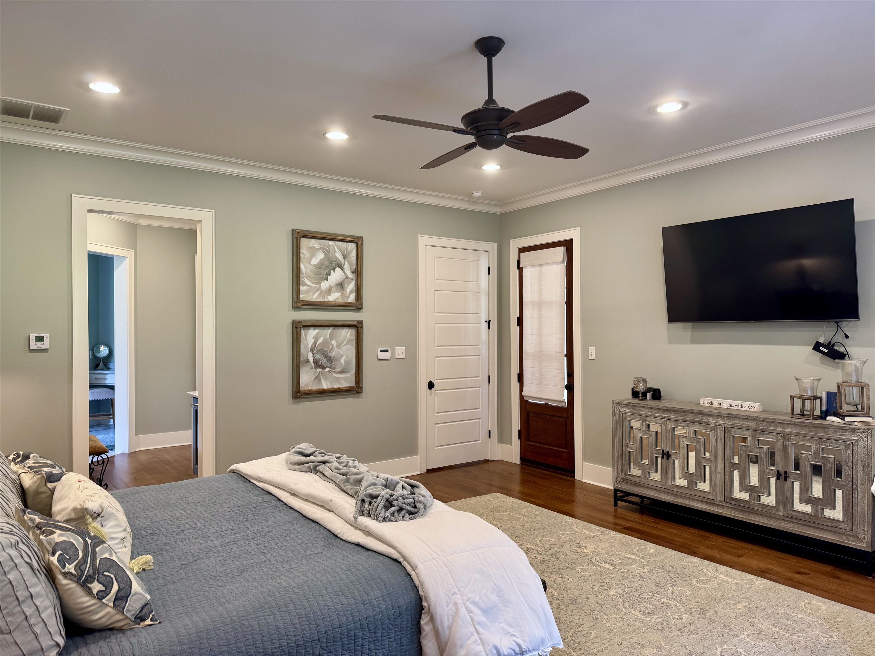 10879 Latting Road Eads, TN 38028 - Photo 39 of 40 a bedroom with a bed and a flat screen tv