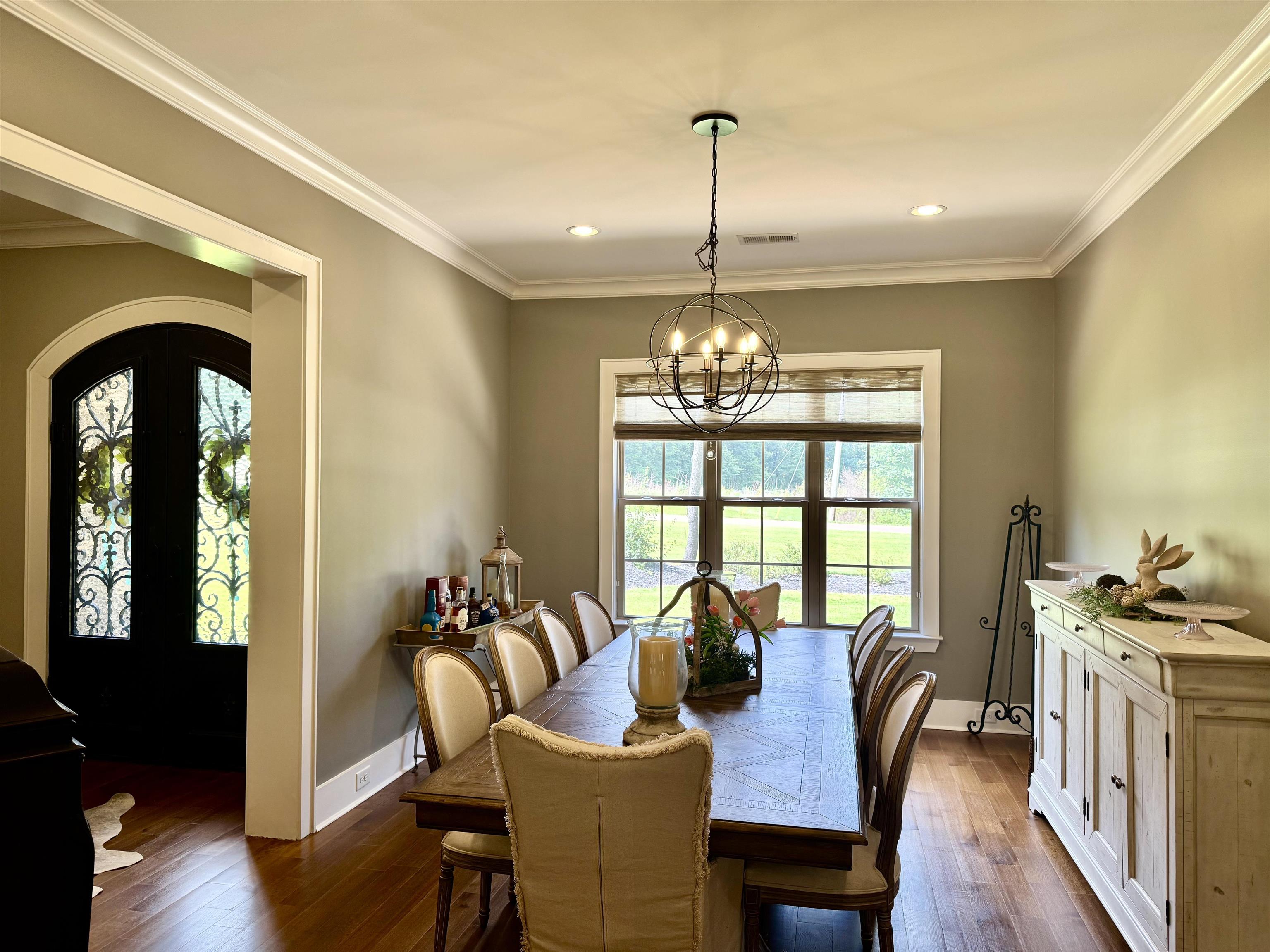 10879 Latting Road Eads, TN 38028 - Photo 9 of 40 a view of a dining room with furniture window and wooden floor