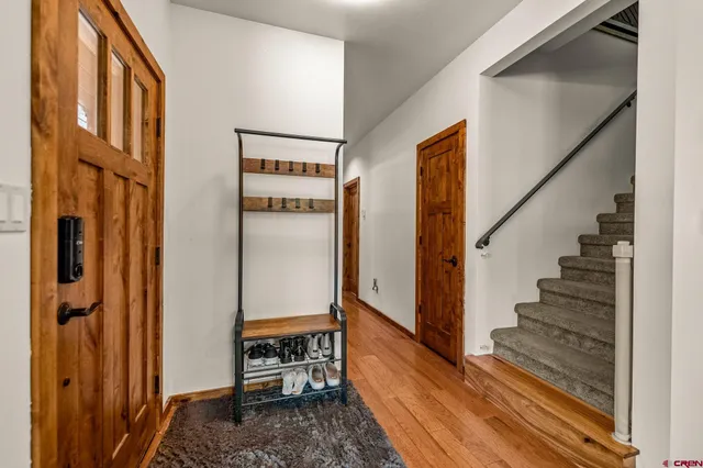 a view of a hallway with staircase
