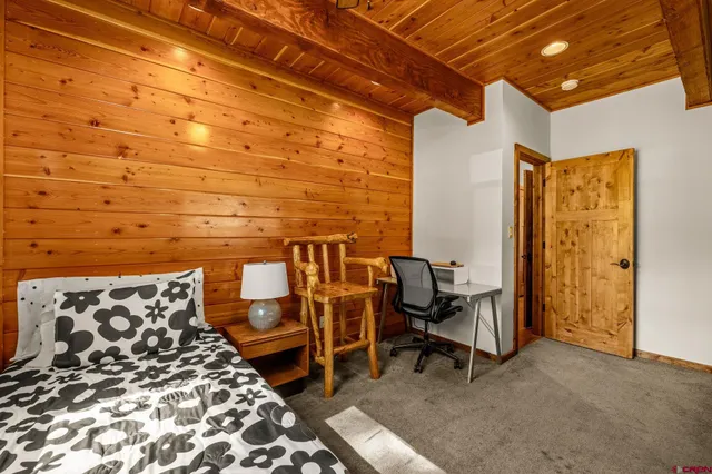 a balcony with chairs and outdoor space