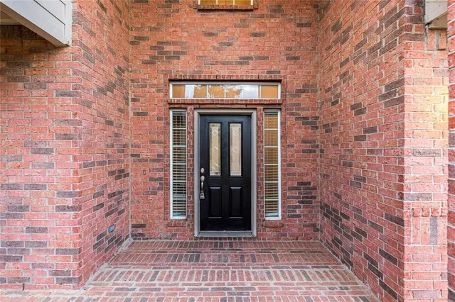 a front view of a house with an empty space