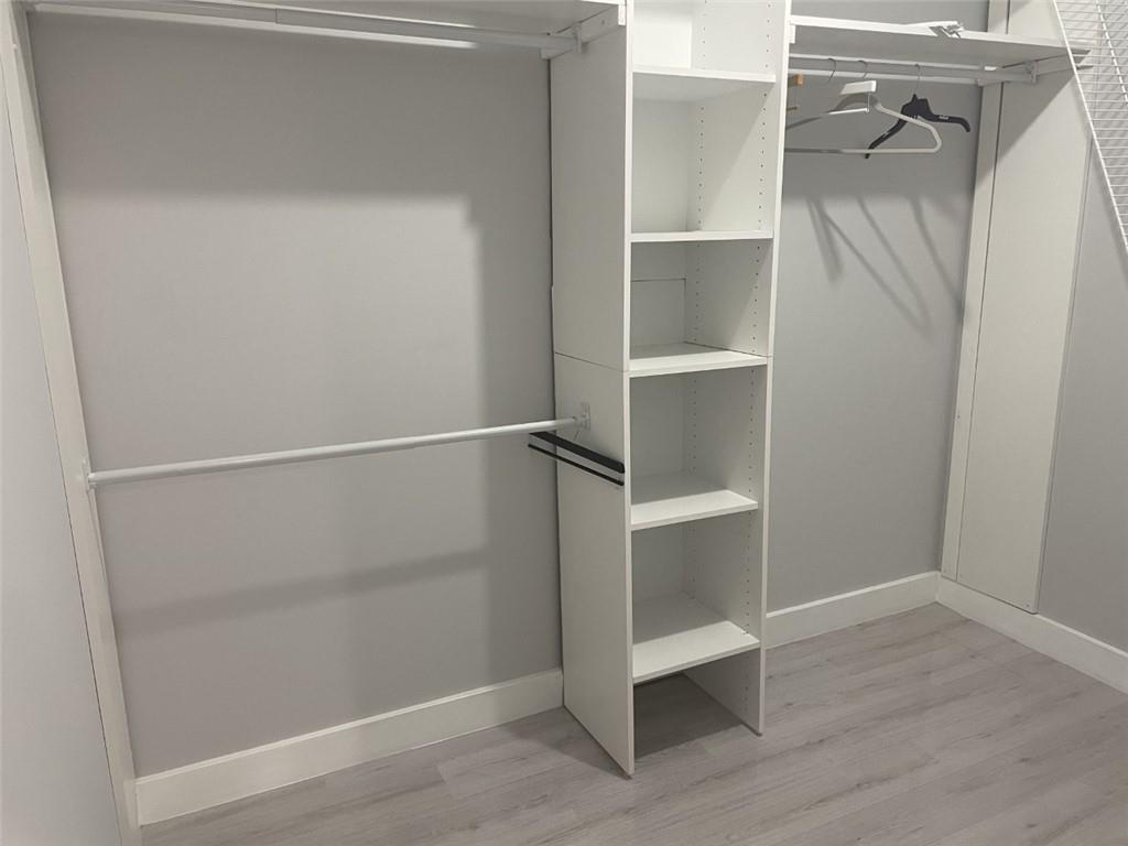 1721 Whitehall Drive, Unit 404 Davie, FL 33324 - Photo 10 of 16 a view of an empty walk in closet