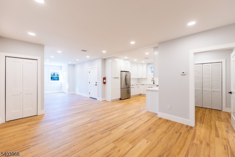 24 Bertrand Island Road Mount Arlington, NJ 07856 - Photo 16 of 44 a view of a kitchen with wooden floor