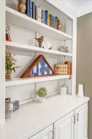 a room with a book shelf