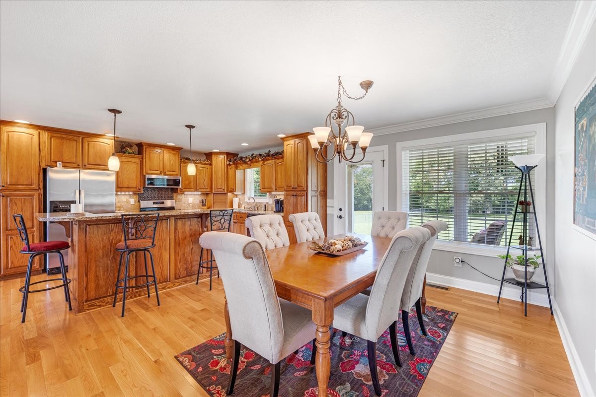 379 Hooper Road Winchester, TN 37398 - Photo 19 of 52 a view of a dining room with furniture window and outside view