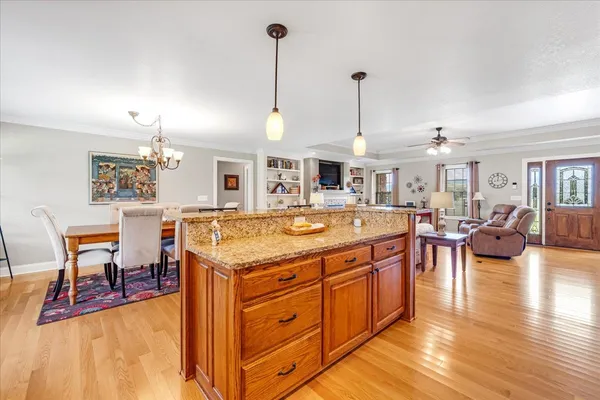 a view of a kitchen and dining room
