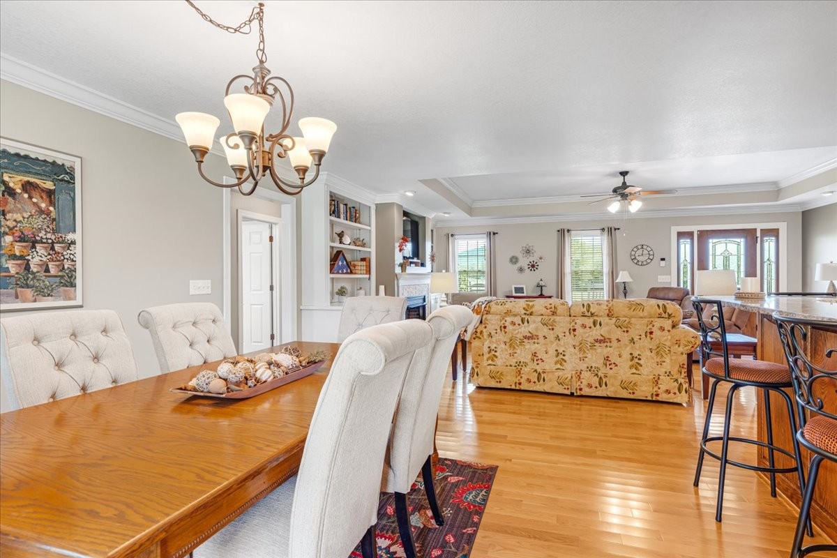 379 Hooper Road Winchester, TN 37398 - Photo 22 of 52 a living room with dining table and wooden floor