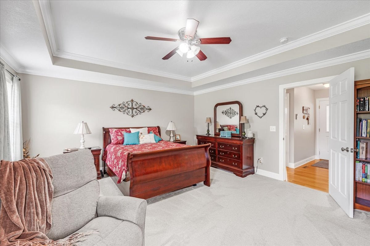 379 Hooper Road Winchester, TN 37398 - Photo 24 of 52 a bedroom with furniture and a ceiling fan