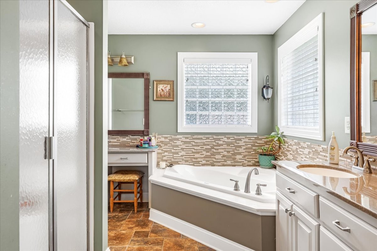 379 Hooper Road Winchester, TN 37398 - Photo 28 of 52 a bathroom with a bathtub and a sink