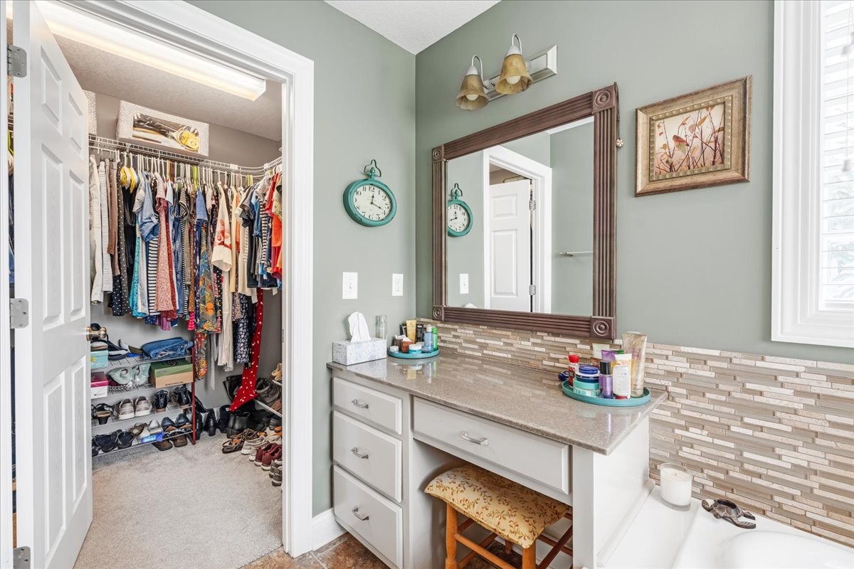 379 Hooper Road Winchester, TN 37398 - Photo 32 of 52 a bathroom with a sink mirror and vanity