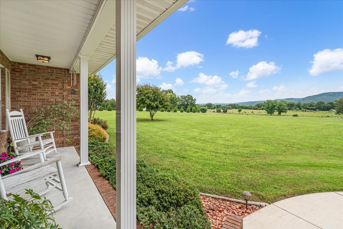 379 Hooper Road Winchester, TN 37398 - Photo 5 of 52 a view of a patio with a table and chairs