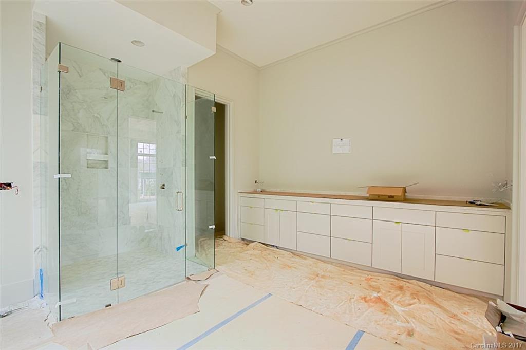 3935 Abingdon Road Charlotte, NC 28211 - Photo 22 of 23 a bathroom with a shower and a sink