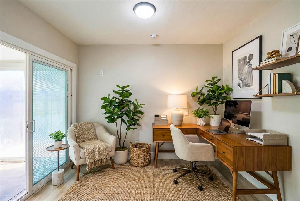 621 Main Street Roanoke, TX 76262 - Photo 23 of 30 a workspace with furniture and a potted plant