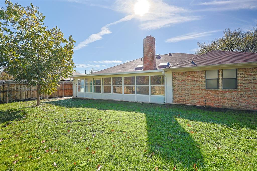 621 Main Street Roanoke, TX 76262 - Photo 26 of 30 a front view of a house with a garden