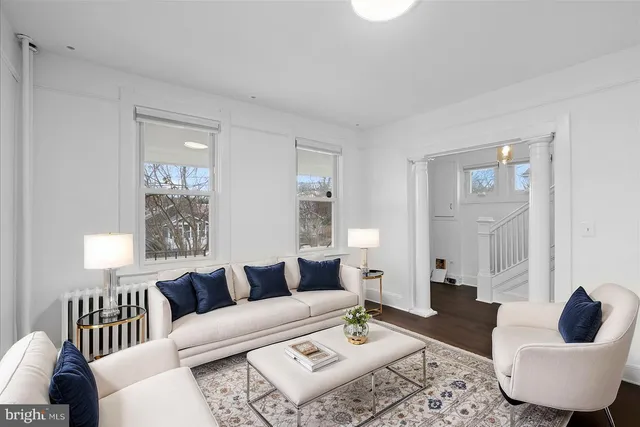 a living room with furniture and a couch