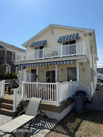 a view of a house with a deck