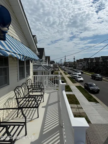 a view of a chairs and table on the terrace