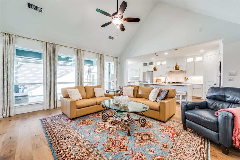 2390 Red Cedar Trail Prosper, TX 75078 - Photo 16 of 40 a living room with furniture and a large window