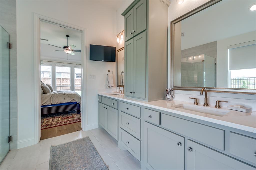 2390 Red Cedar Trail Prosper, TX 75078 - Photo 25 of 40 a en suite bathroom with double sink and a large mirror