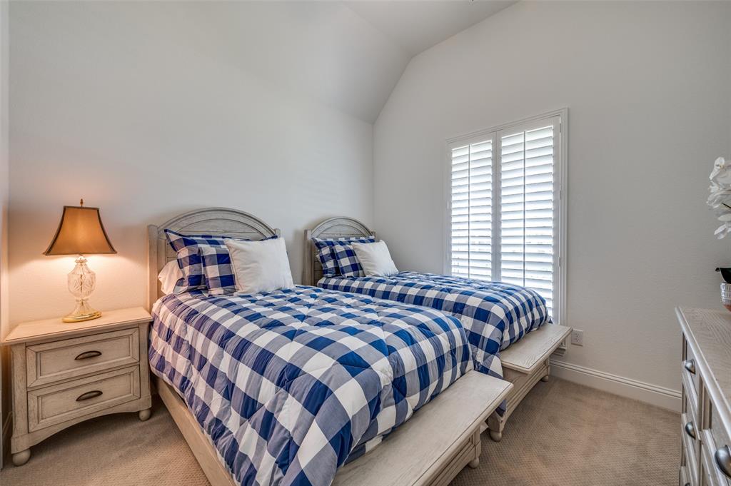2390 Red Cedar Trail Prosper, TX 75078 - Photo 30 of 40 a bedroom with two beds and lamp
