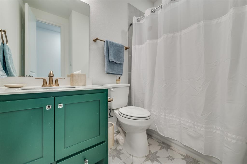 2390 Red Cedar Trail Prosper, TX 75078 - Photo 31 of 40 a bathroom with a sink toilet and shower