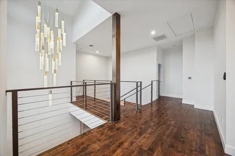a view of staircase with lots of wooden floor