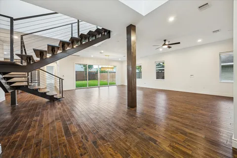 a view of an entryway with wooden floor