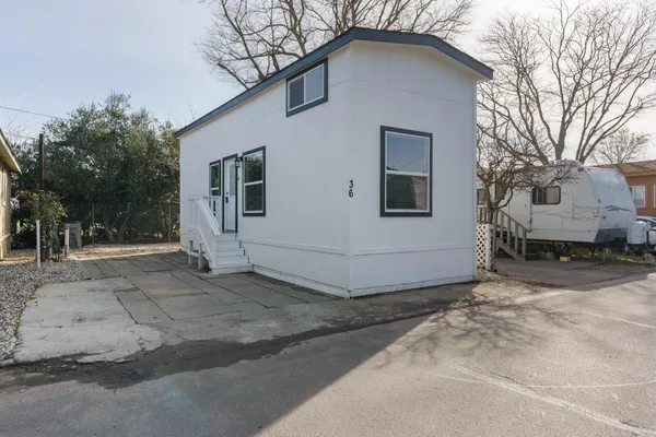 a house with white door of garage