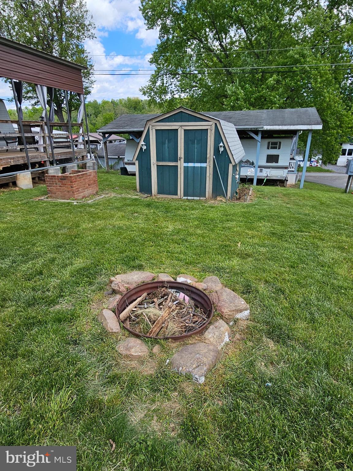 21 Campfire Boulevard Falling Waters, WV 25419 - Photo 11 of 30 a house view with swimming pool and garden space