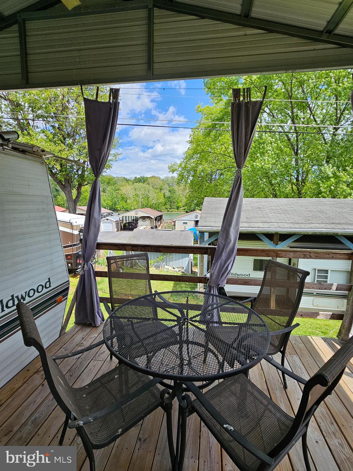 21 Campfire Boulevard Falling Waters, WV 25419 - Photo 7 of 30 a view of a chairs and table in patio