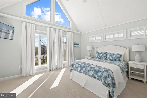 a view of a house with sitting area and garden