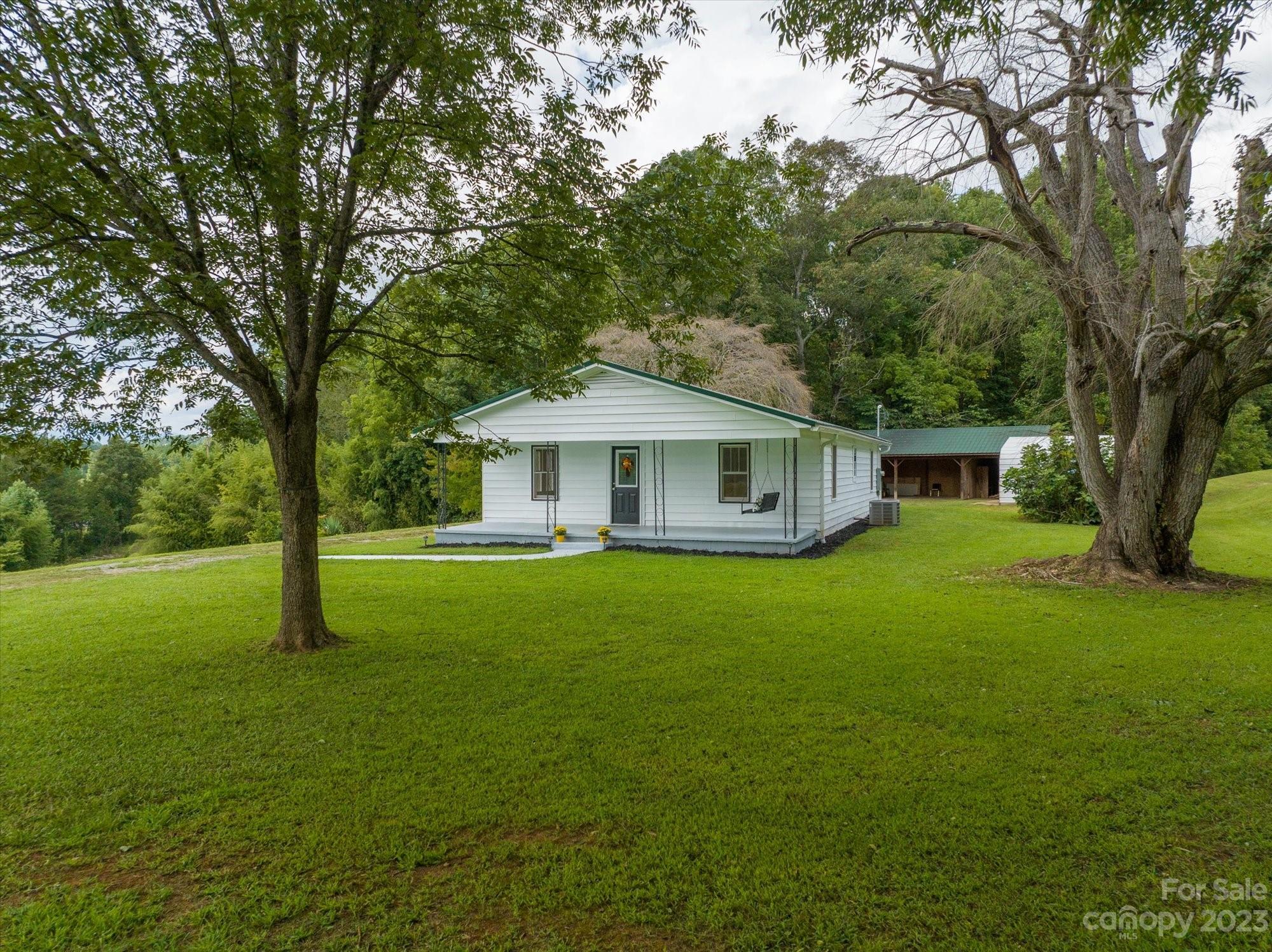 2540 Maple Creek Road Rutherfordton, NC 28139 - Photo 1 of 48 a front view of house with yard and green space