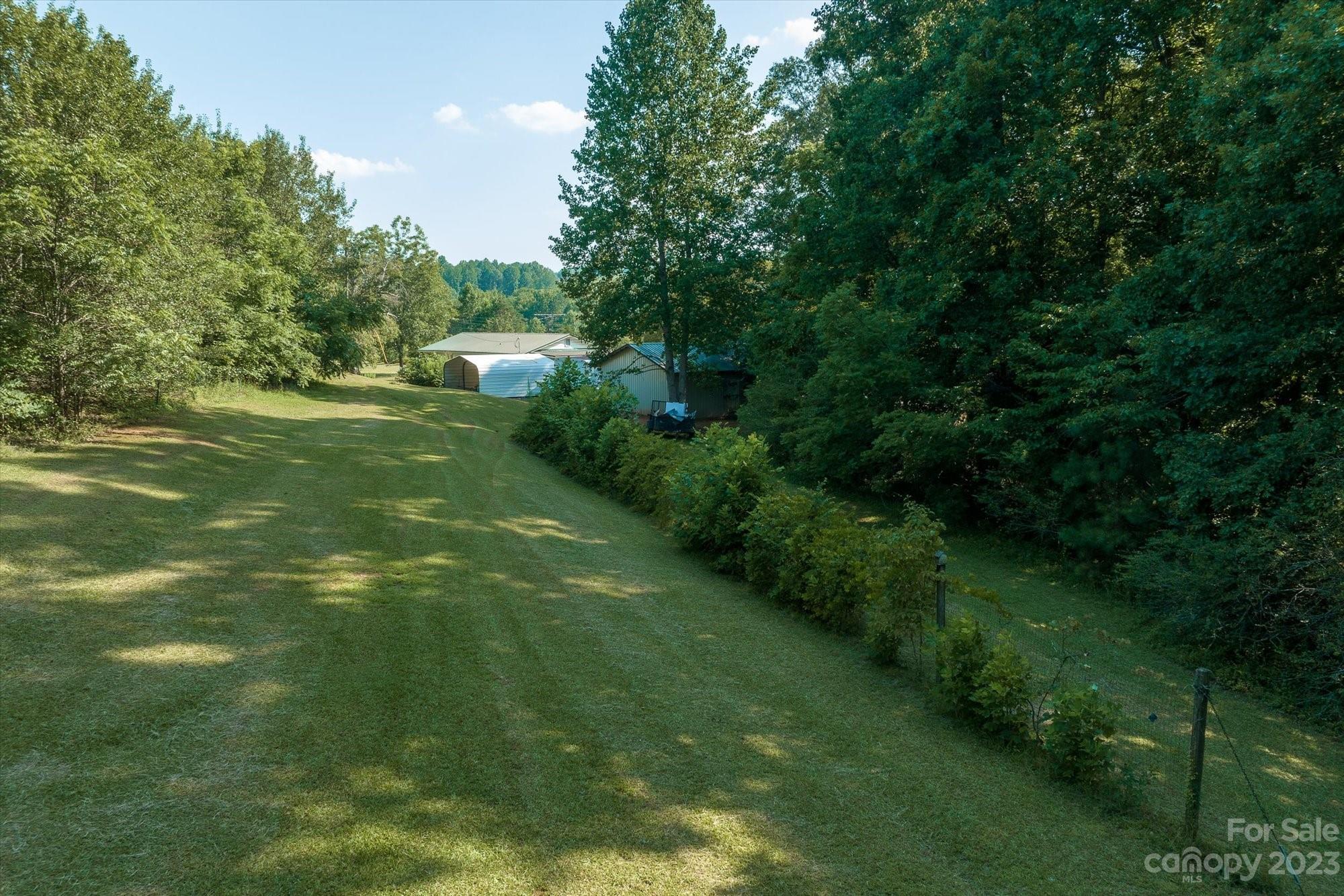 2540 Maple Creek Road Rutherfordton, NC 28139 - Photo 20 of 48 a view of a lush green space