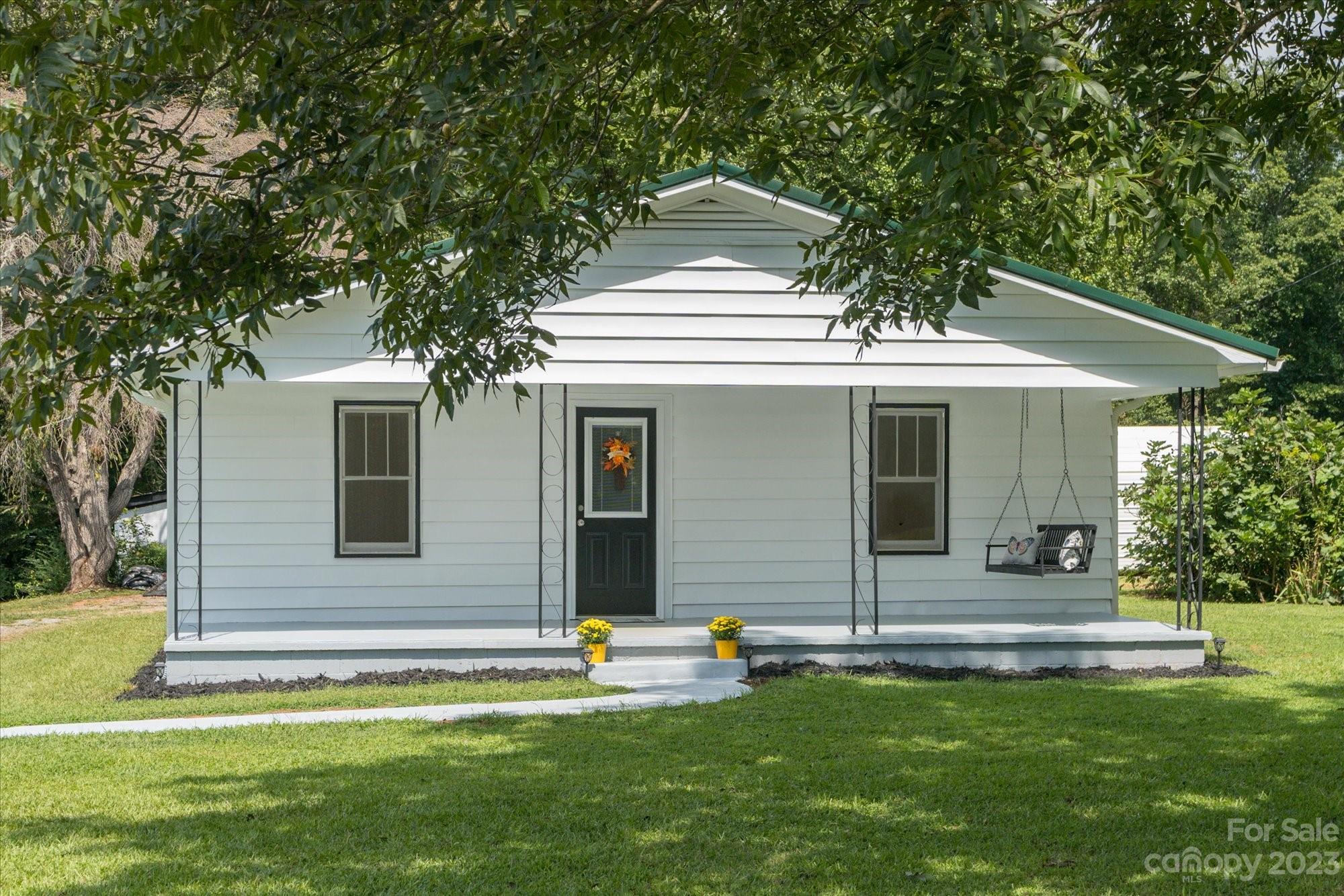 2540 Maple Creek Road Rutherfordton, NC 28139 - Photo 2 of 48 a front view of a house with a yard