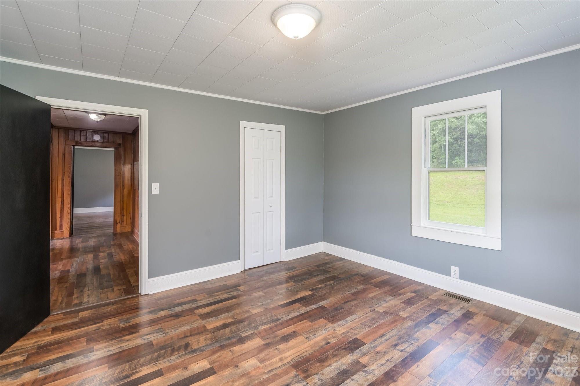 2540 Maple Creek Road Rutherfordton, NC 28139 - Photo 22 of 48 an empty room with windows and closet