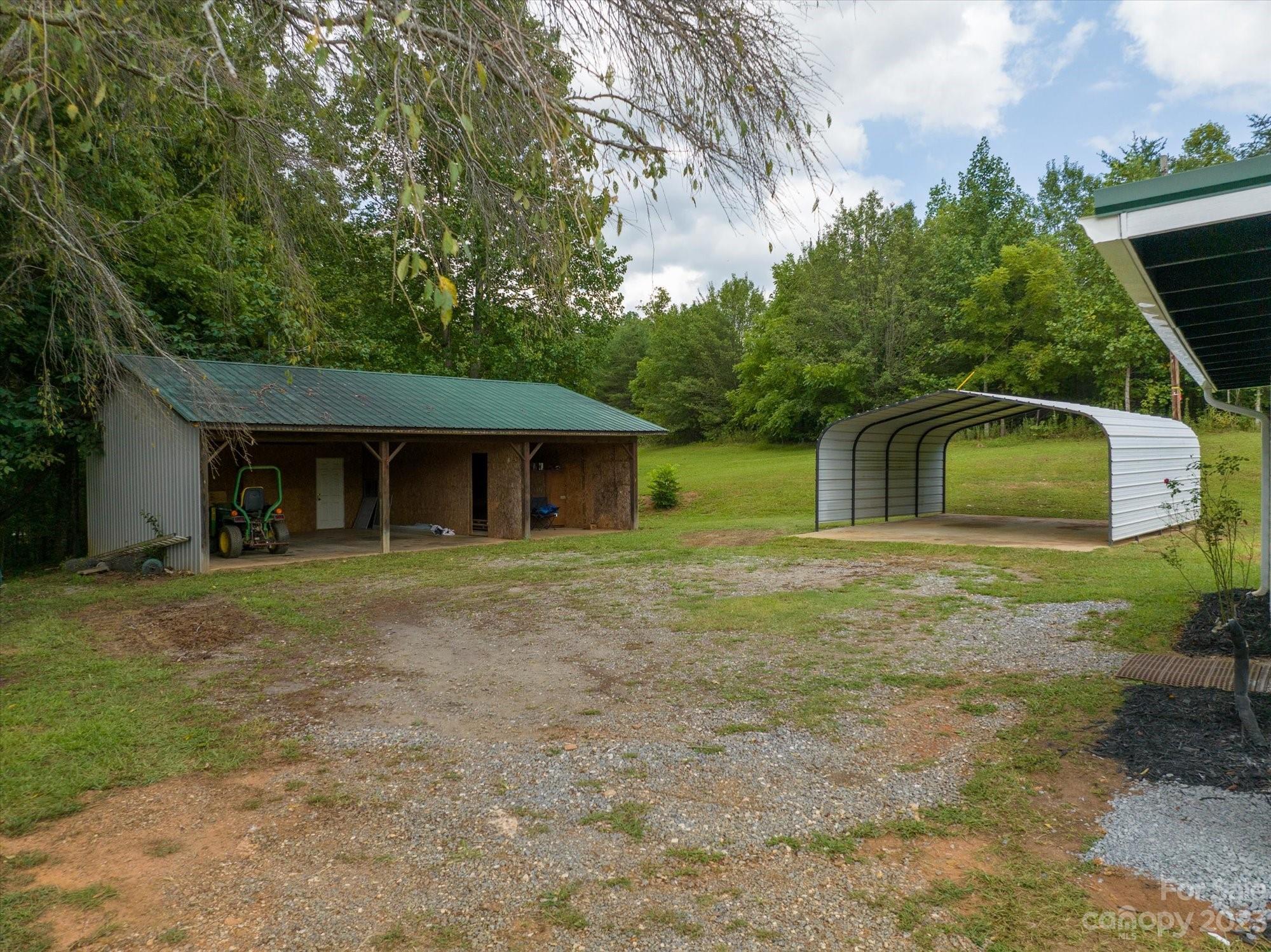2540 Maple Creek Road Rutherfordton, NC 28139 - Photo 40 of 48 a front view of a house with a yard