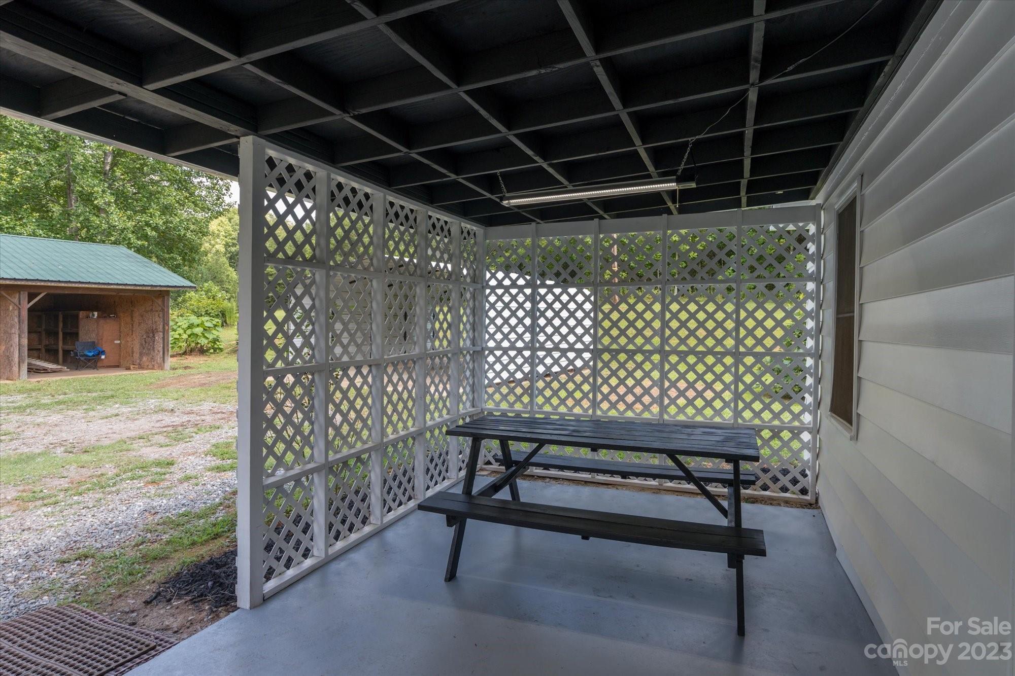 2540 Maple Creek Road Rutherfordton, NC 28139 - Photo 41 of 48 a view of a porch with a bench