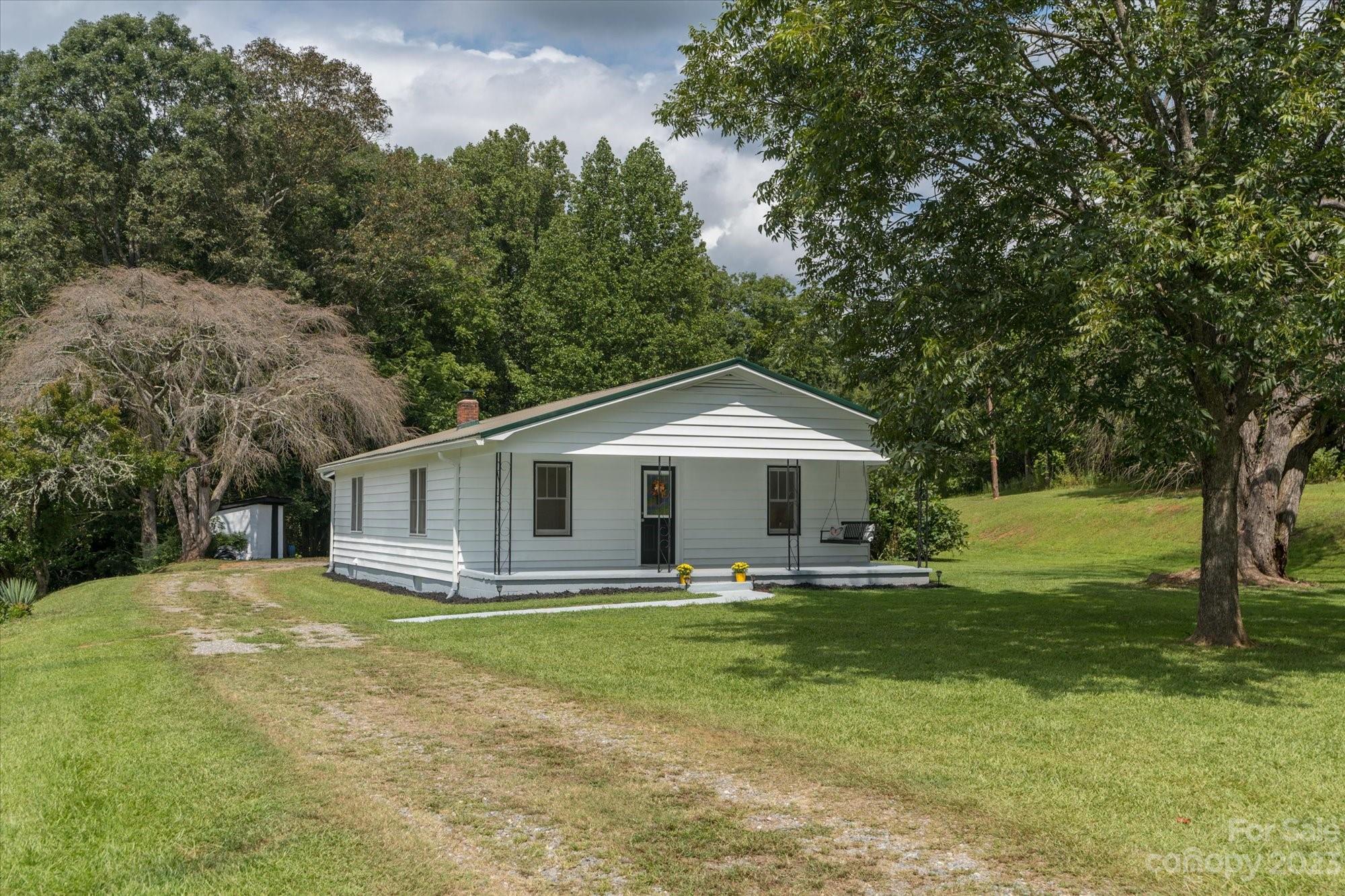 2540 Maple Creek Road Rutherfordton, NC 28139 - Photo 42 of 48 a front view of a house with yard and green space