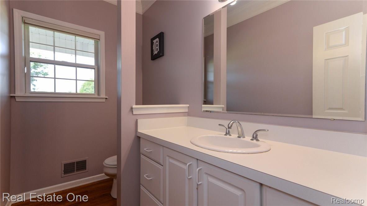 1824 Park Ridge Court Howell, MI 48843 - Photo 16 of 47 POWDER ROOM CONVENIENT TO LIVING SPACE.