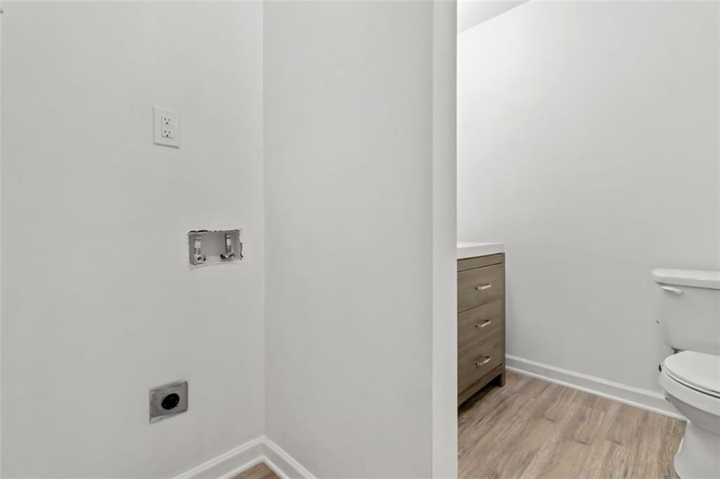 2340 Beaver Ruin Road, Unit 16 Norcross, GA 30071 - Photo 17 of 28 a bathroom with a toilet and a shower